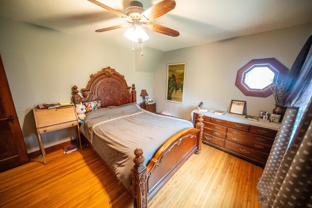 bedroom featuring a ceiling fan and light wood finished floors