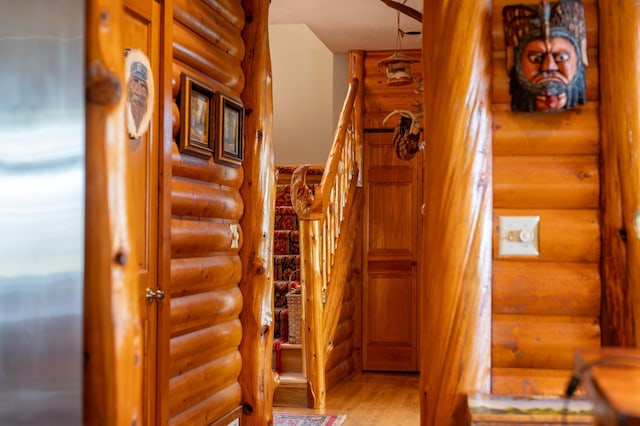 51641 Edgewater Rd, Spring Lake, MN 56680 - staircase with rustic walls and wood finished floors