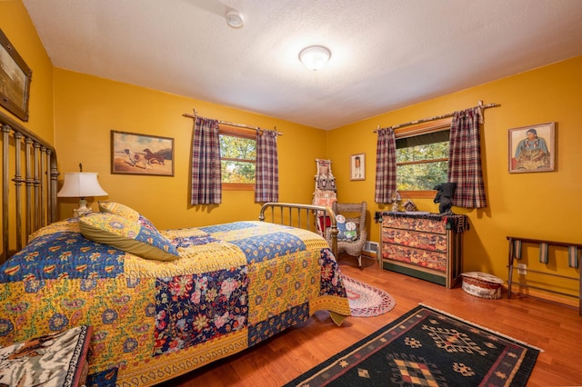 51641 Edgewater Rd, Spring Lake, MN 56680 - bedroom with wood finished floors