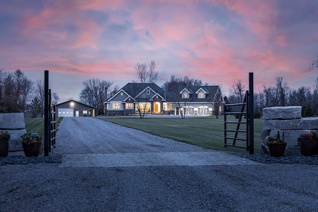 view of street with a gated entry and driveway
