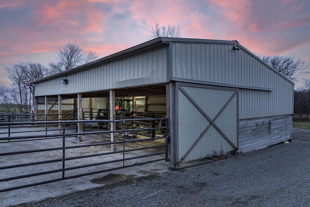 view of outbuilding featuring an outdoor structure and an exterior structure