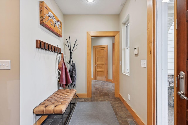 mudroom featuring baseboards and visible vents