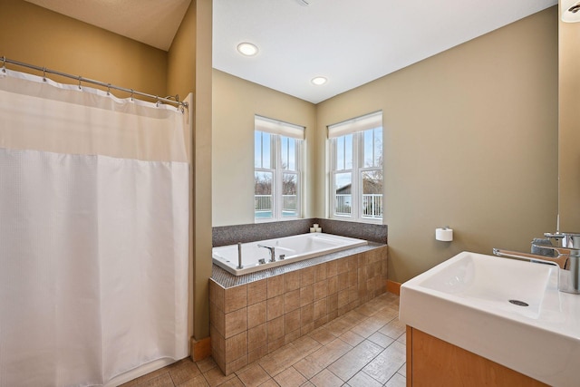 bathroom featuring a garden tub, tile patterned flooring, vanity, recessed lighting, and a shower with shower curtain