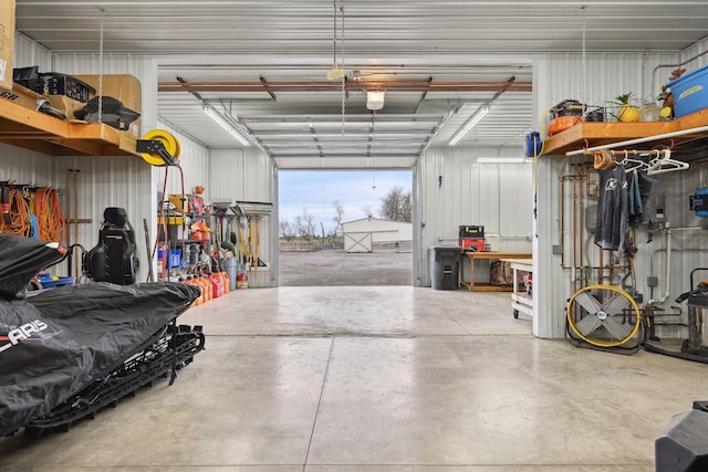 garage with a workshop area