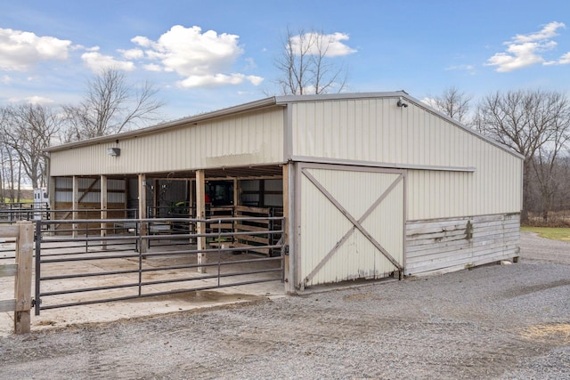 view of outbuilding featuring an exterior structure and an outbuilding