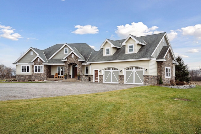 craftsman house featuring a shingled roof, a front lawn, aphalt driveway, a garage, and stone siding