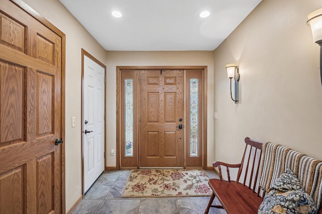 entryway with recessed lighting, baseboards, and plenty of natural light