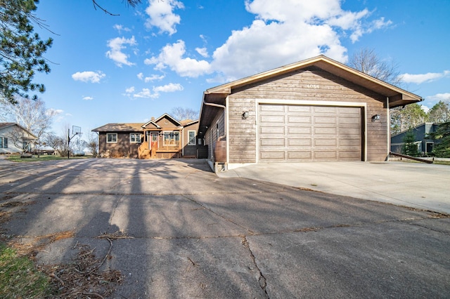 ranch-style house with driveway