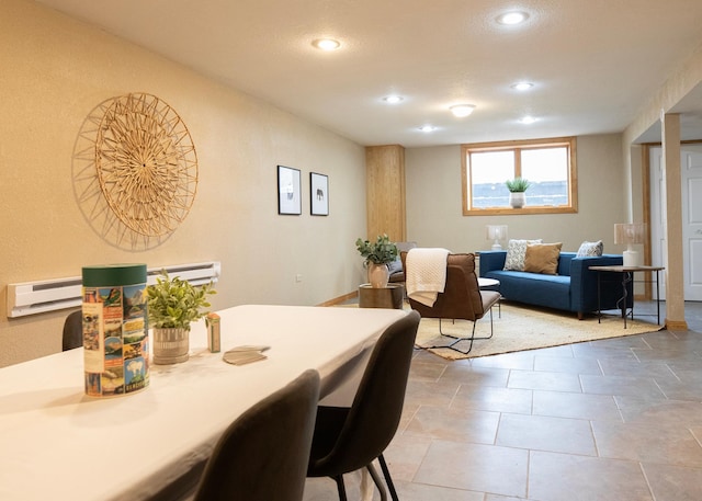 dining space with recessed lighting