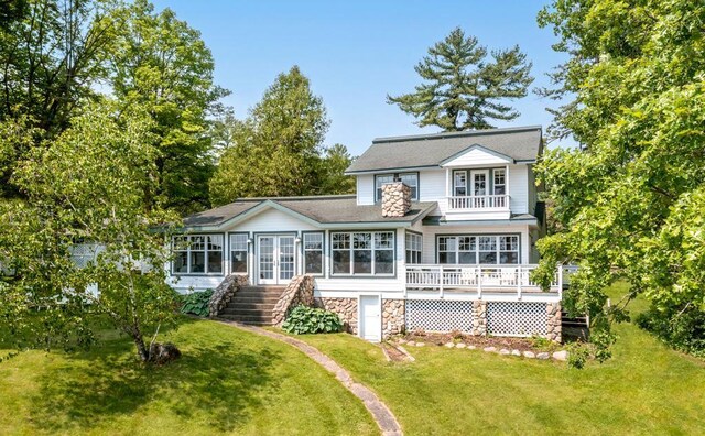 9472 Rocky Point Trl, Lake Shore, MN 56468 - back of house with a yard, french doors, a balcony, a wooden deck, and stairs