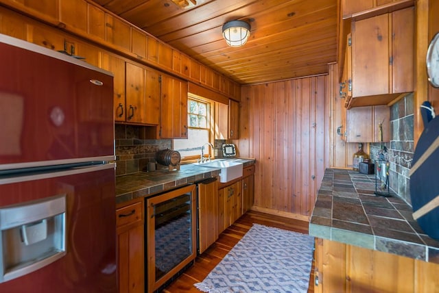 9472 Rocky Point Trl, Lake Shore, MN 56468 - kitchen featuring wine cooler, tile countertops, wood ceiling, fridge with ice dispenser, and brown cabinets