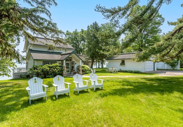 9472 Rocky Point Trl, Lake Shore, MN 56468 - view of grassy yard featuring a garage and an outdoor structure