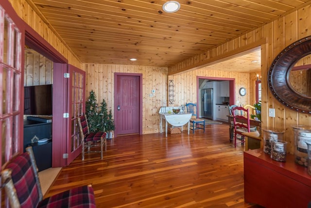 9472 Rocky Point Trl, Lake Shore, MN 56468 - entrance foyer featuring wood finished floors, wood walls, and wood ceiling