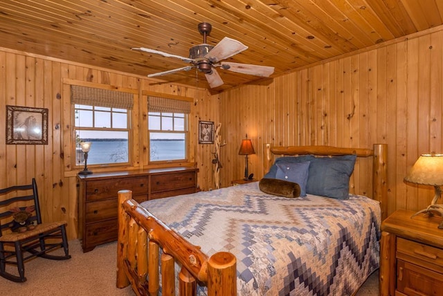 9472 Rocky Point Trl, Lake Shore, MN 56468 - bedroom featuring wood ceiling, light carpet, and wood walls