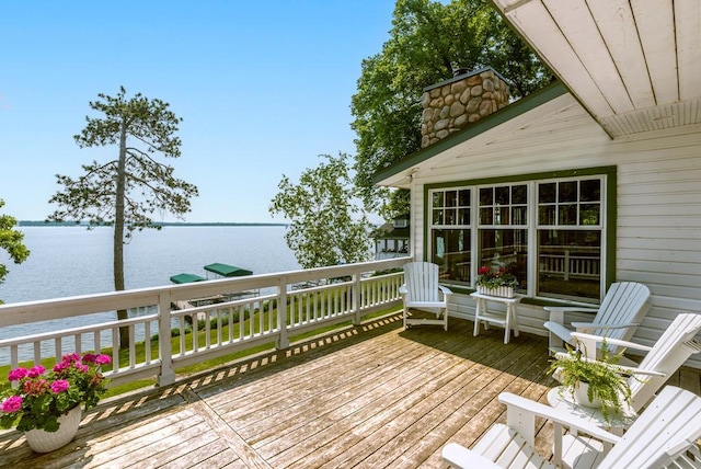 9472 Rocky Point Trl, Lake Shore, MN 56468 - wooden terrace featuring a water view