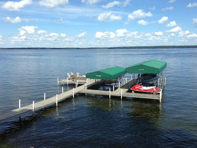 9472 Rocky Point Trl, Lake Shore, MN 56468 - dock featuring boat lift and a water view