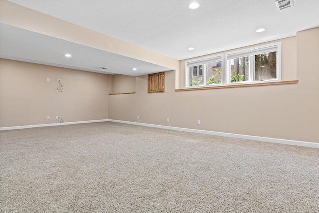 1337 Kenilworth Dr, Woodbury, MN 55125 - interior space featuring carpet floors, baseboards, recessed lighting, and visible vents