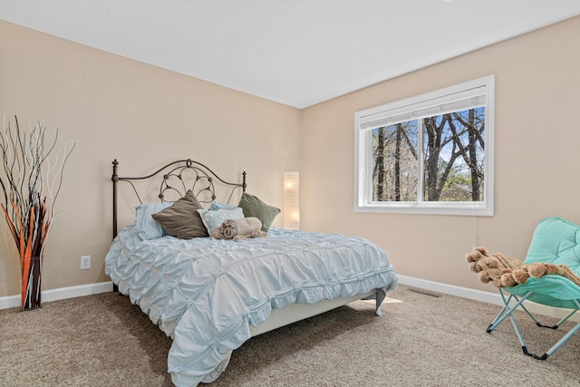 1337 Kenilworth Dr, Woodbury, MN 55125 - carpeted bedroom featuring baseboards and visible vents