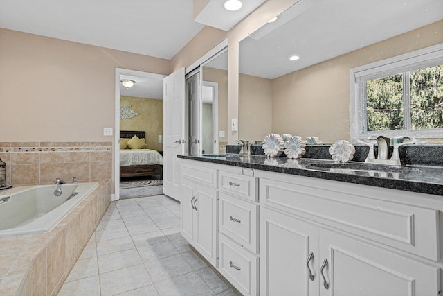 1337 Kenilworth Dr, Woodbury, MN 55125 - ensuite bathroom featuring a sink, double vanity, tile patterned floors, ensuite bathroom, and a bath