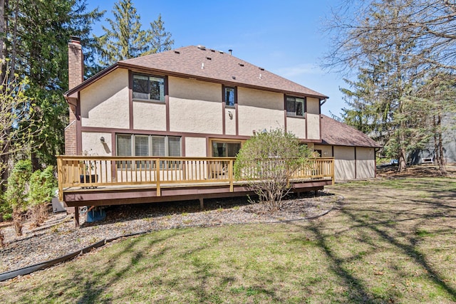 1337 Kenilworth Dr, Woodbury, MN 55125 - rear view of property featuring a wooden deck, a chimney, and stucco siding