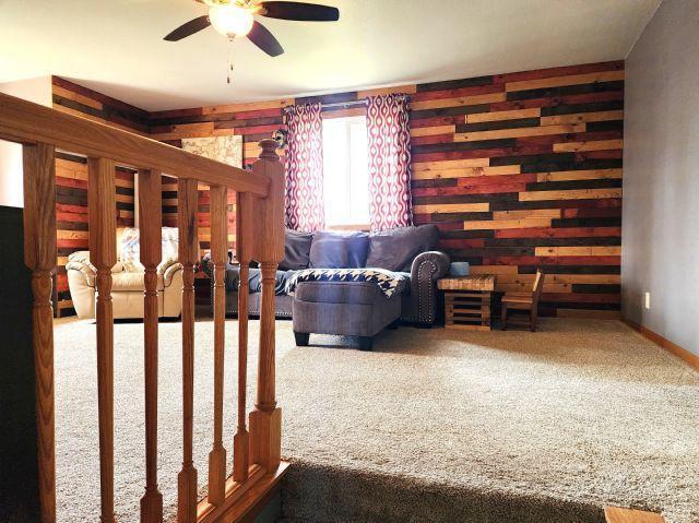 21 Main St, Luck, WI 54853 - bedroom featuring carpet floors and wooden walls