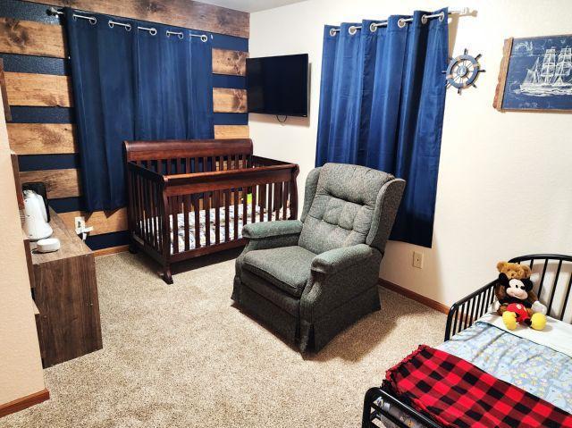 21 Main St, Luck, WI 54853 - bedroom with carpet flooring and baseboards