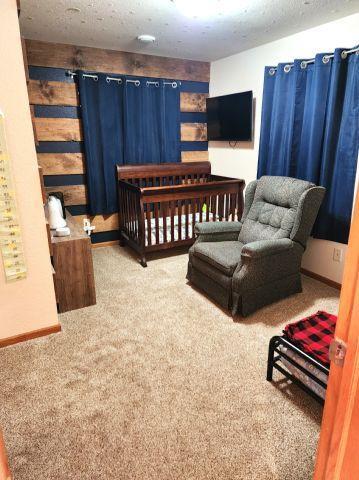 21 Main St, Luck, WI 54853 - carpeted bedroom with baseboards