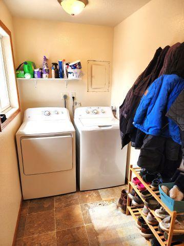 21 Main St, Luck, WI 54853 - laundry area featuring washer and dryer and electric panel