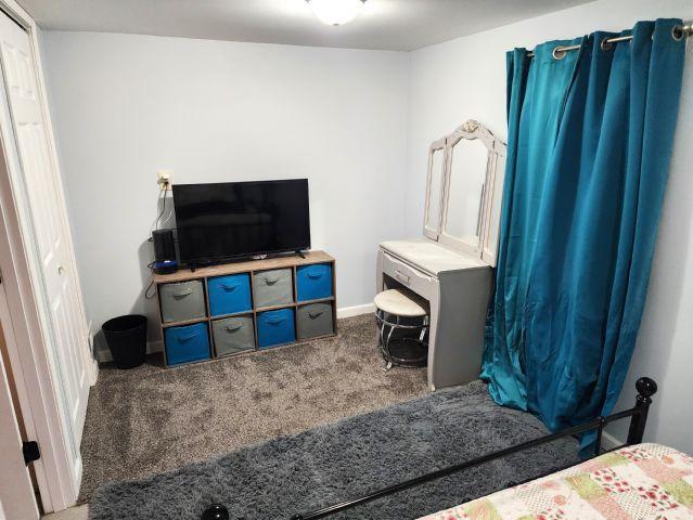 21 Main St, Luck, WI 54853 - bedroom featuring carpet and baseboards