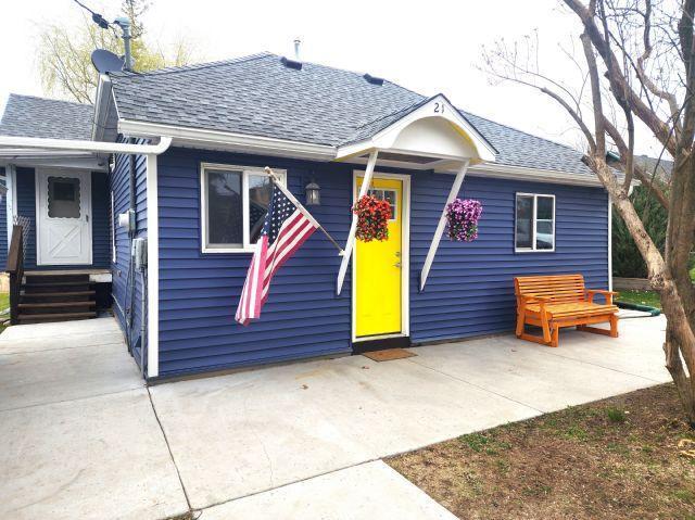 21 Main St, Luck, WI 54853 - view of front facade featuring roof with shingles and entry steps