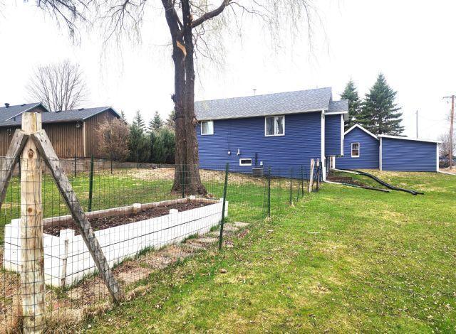 21 Main St, Luck, WI 54853 - view of yard with a garden