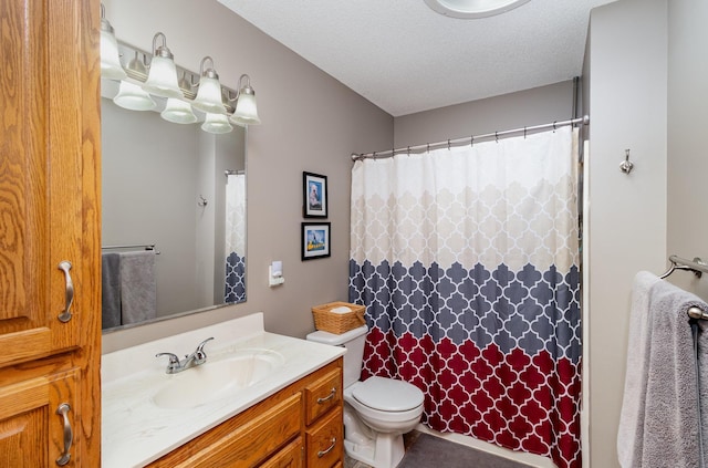bathroom with a shower with shower curtain, a textured ceiling, toilet, and vanity