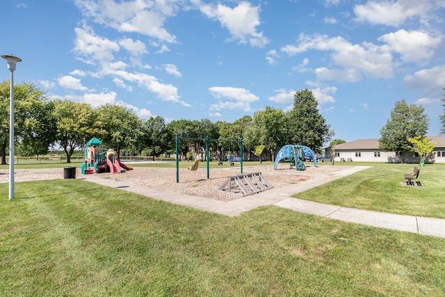 community playground featuring a lawn