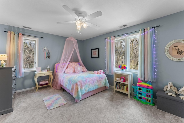 bedroom featuring baseboards, ceiling fan, carpet flooring, and visible vents