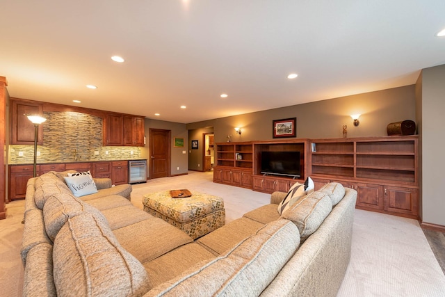 105 Viking Ct, Mankato, MN 56001 - living area featuring light carpet, beverage cooler, and recessed lighting
