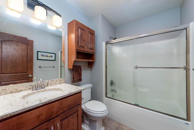 105 Viking Ct, Mankato, MN 56001 - full bathroom featuring toilet, vanity, and combined bath / shower with glass door