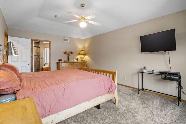 bedroom with ceiling fan, carpet floors, visible vents, and baseboards