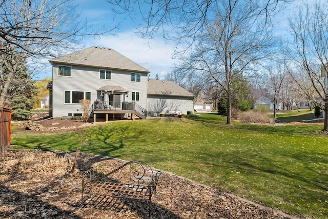rear view of property with stairway, a wooden deck, a gazebo, and a yard
