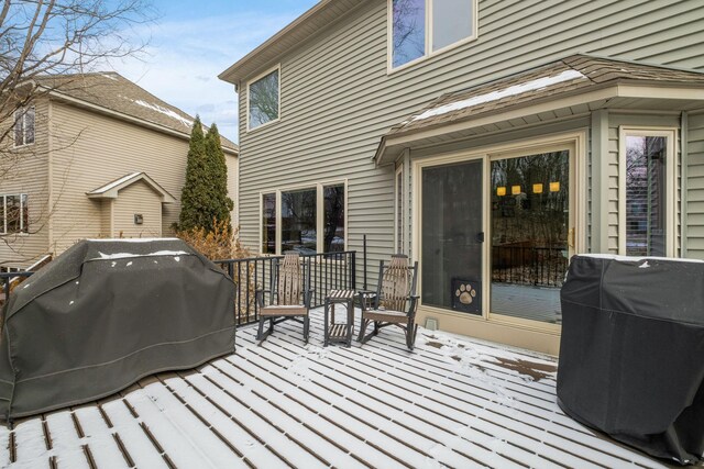 wooden deck featuring area for grilling