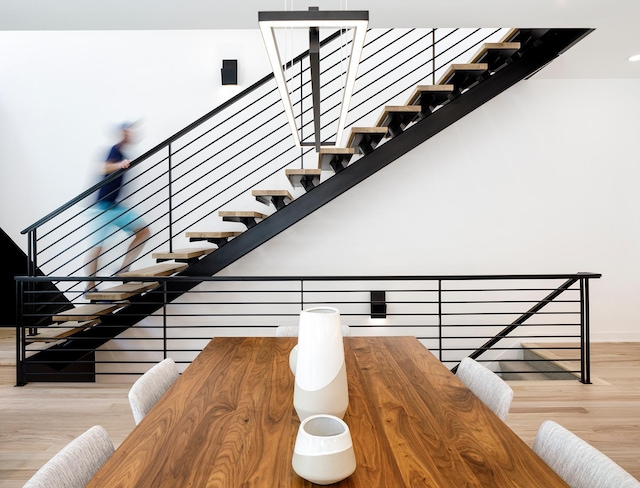 3701 Upton Ave S, Minneapolis, MN 55410 - stairs featuring baseboards and wood finished floors