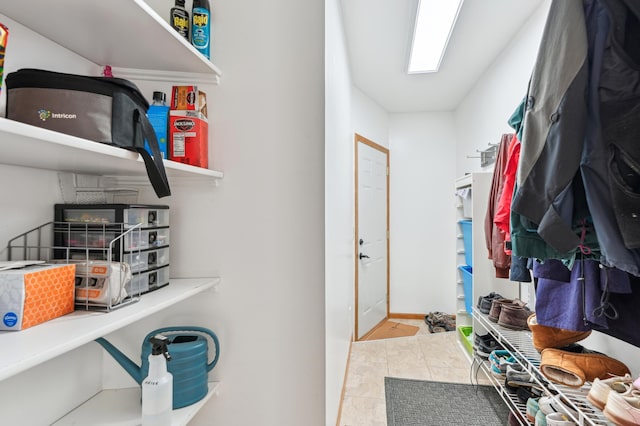 mudroom with tile patterned floors