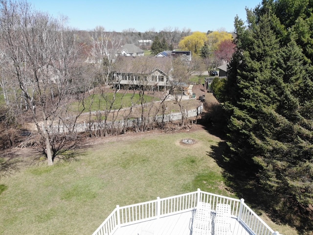 view of yard with fence and a wooden deck