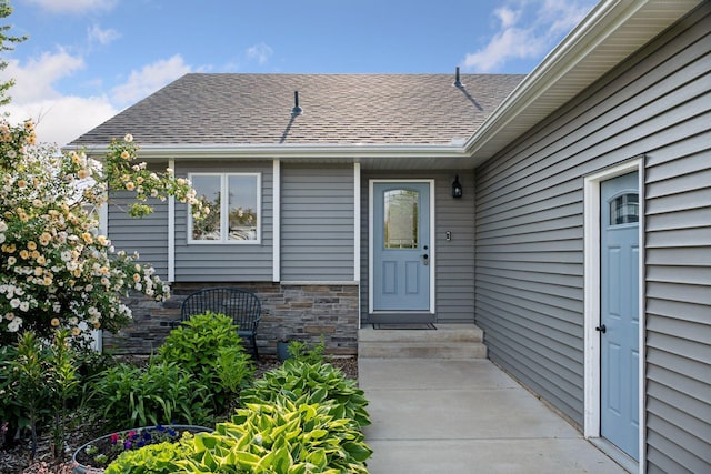 11 6th Ave S, Sartell, MN 56377 - view of exterior entry with a shingled roof