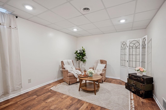 11 6th Ave S, Sartell, MN 56377 - sitting room with wood finished floors, a paneled ceiling, and recessed lighting