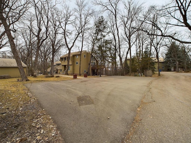 view of road with aphalt driveway