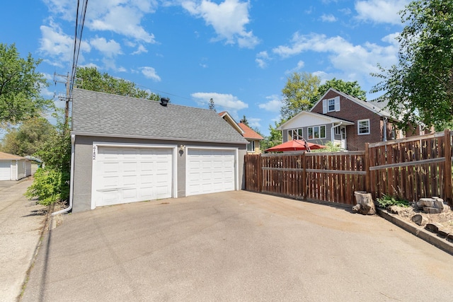 detached garage with fence