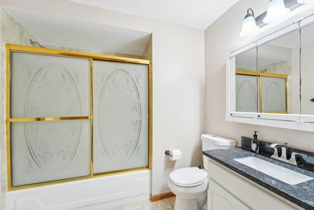 full bathroom featuring vanity, enclosed tub / shower combo, tile patterned floors, and toilet