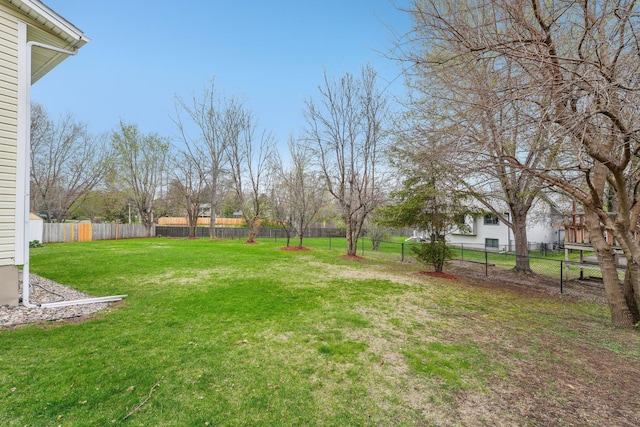 view of yard featuring a fenced backyard