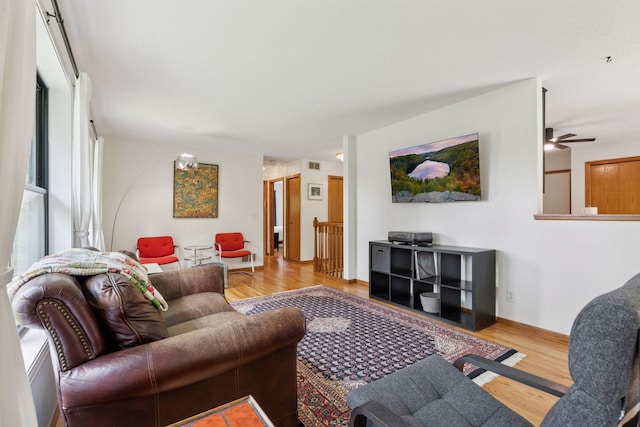 1283 Bidwell St, West Saint Paul, MN 55118 - living area featuring wood finished floors, a ceiling fan, and baseboards