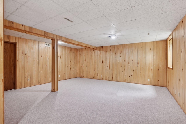 1283 Bidwell St, West Saint Paul, MN 55118 - finished below grade area with carpet flooring, a drop ceiling, and wooden walls